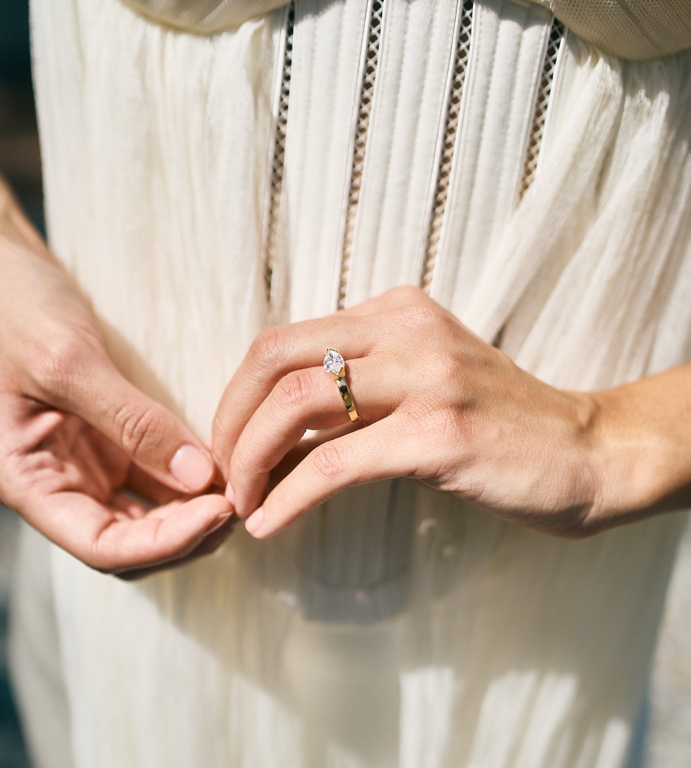 marquise half bezel engagement ring
