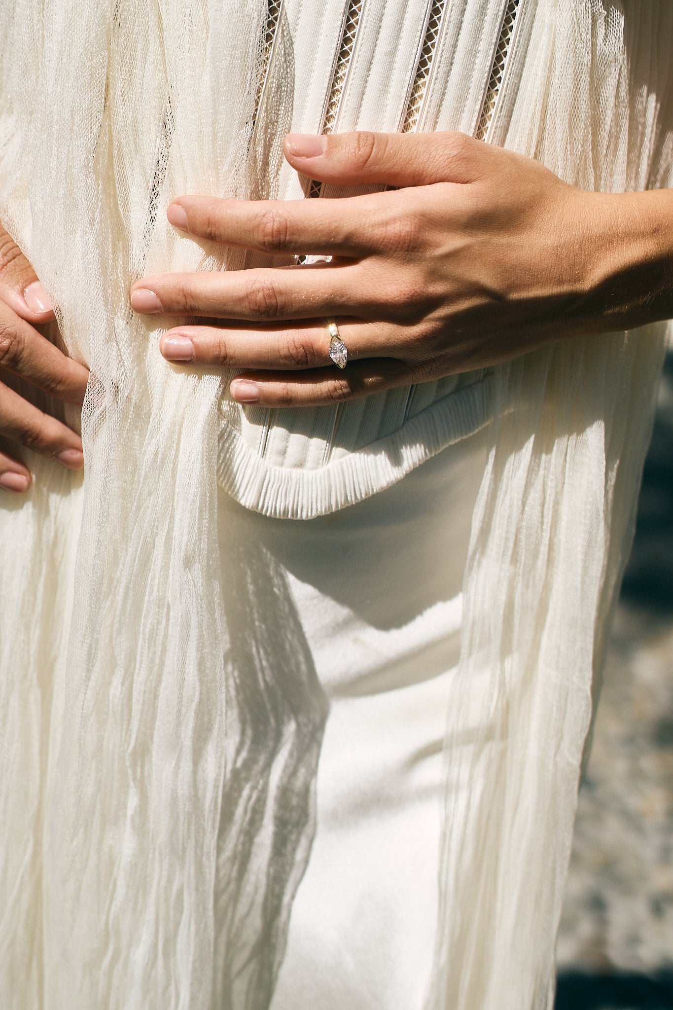 marquise half bezel engagement ring