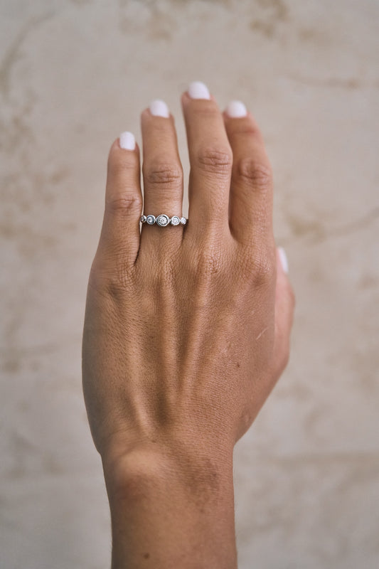 Graduated Bezel Diamond Ring