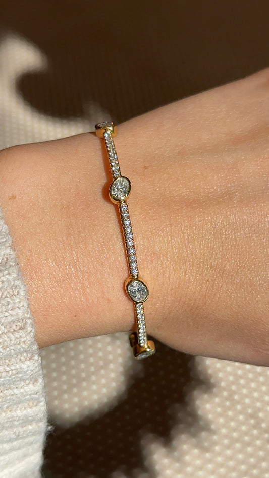Yellow Gold Bezel Oval Diamond Bangle