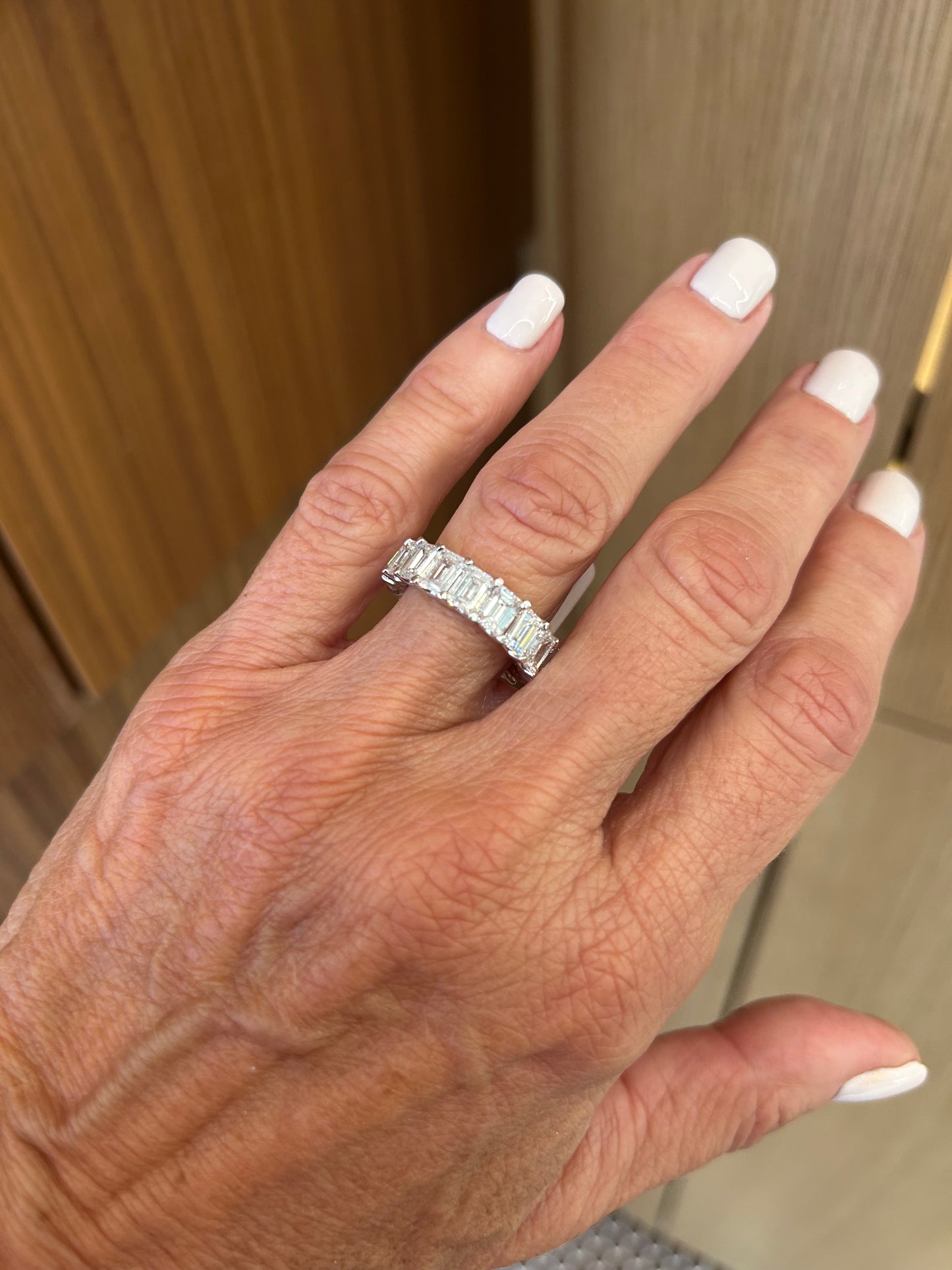Large Emerald Eternity Band – Henri Noël