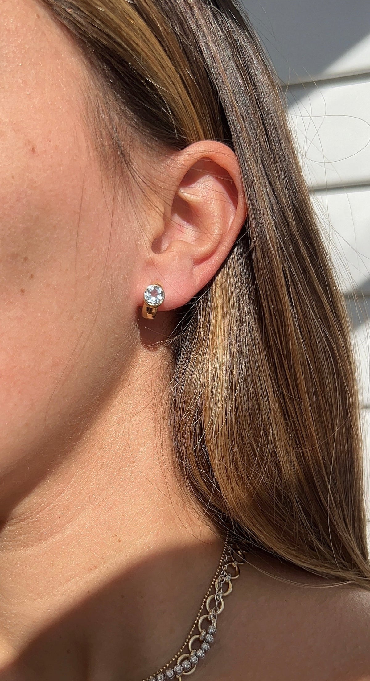 Bezel Blue Topaz Huggies – Henri Noël