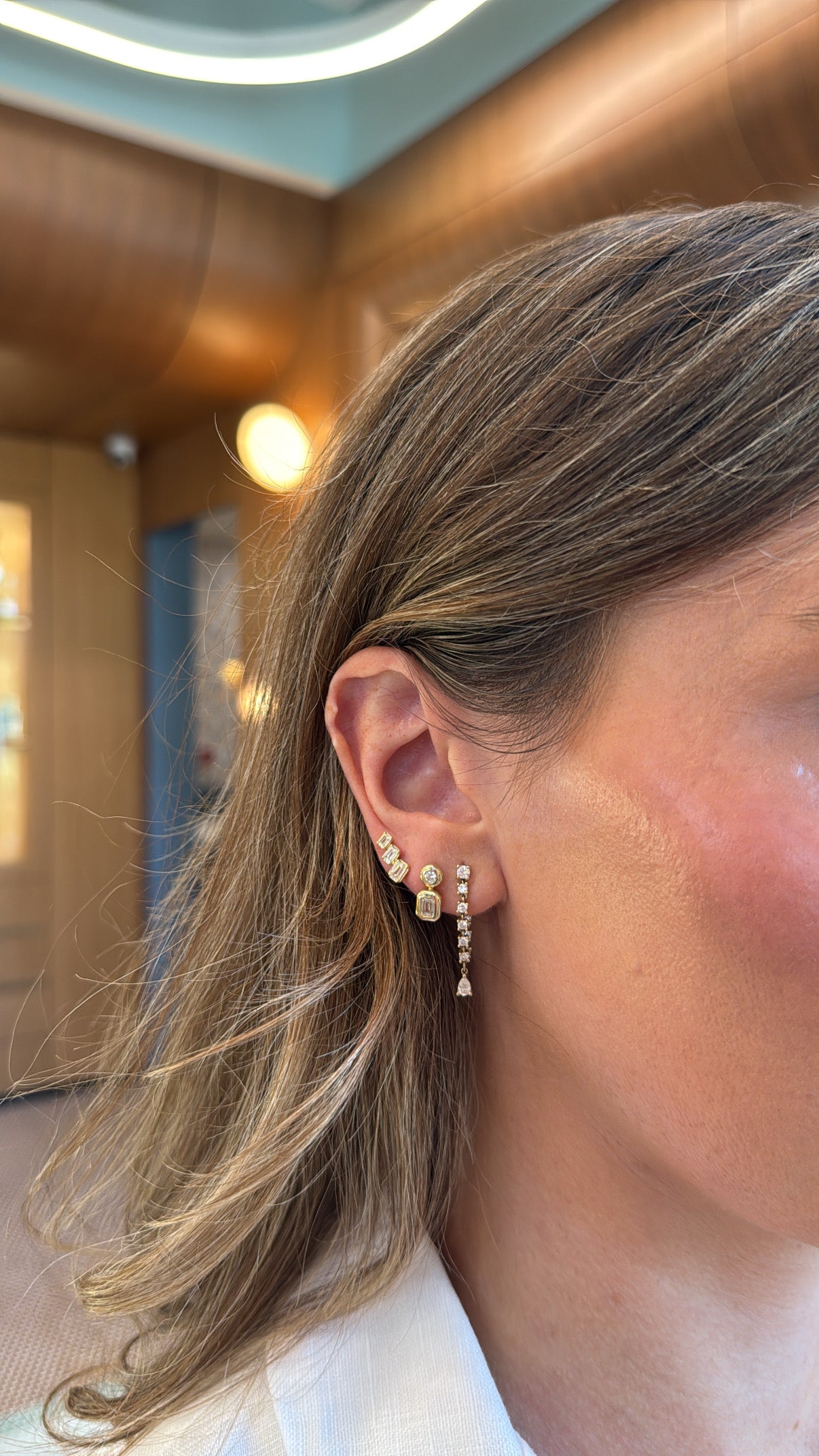 Graduated Emerald Cut Diamond Studs – Henri Noël