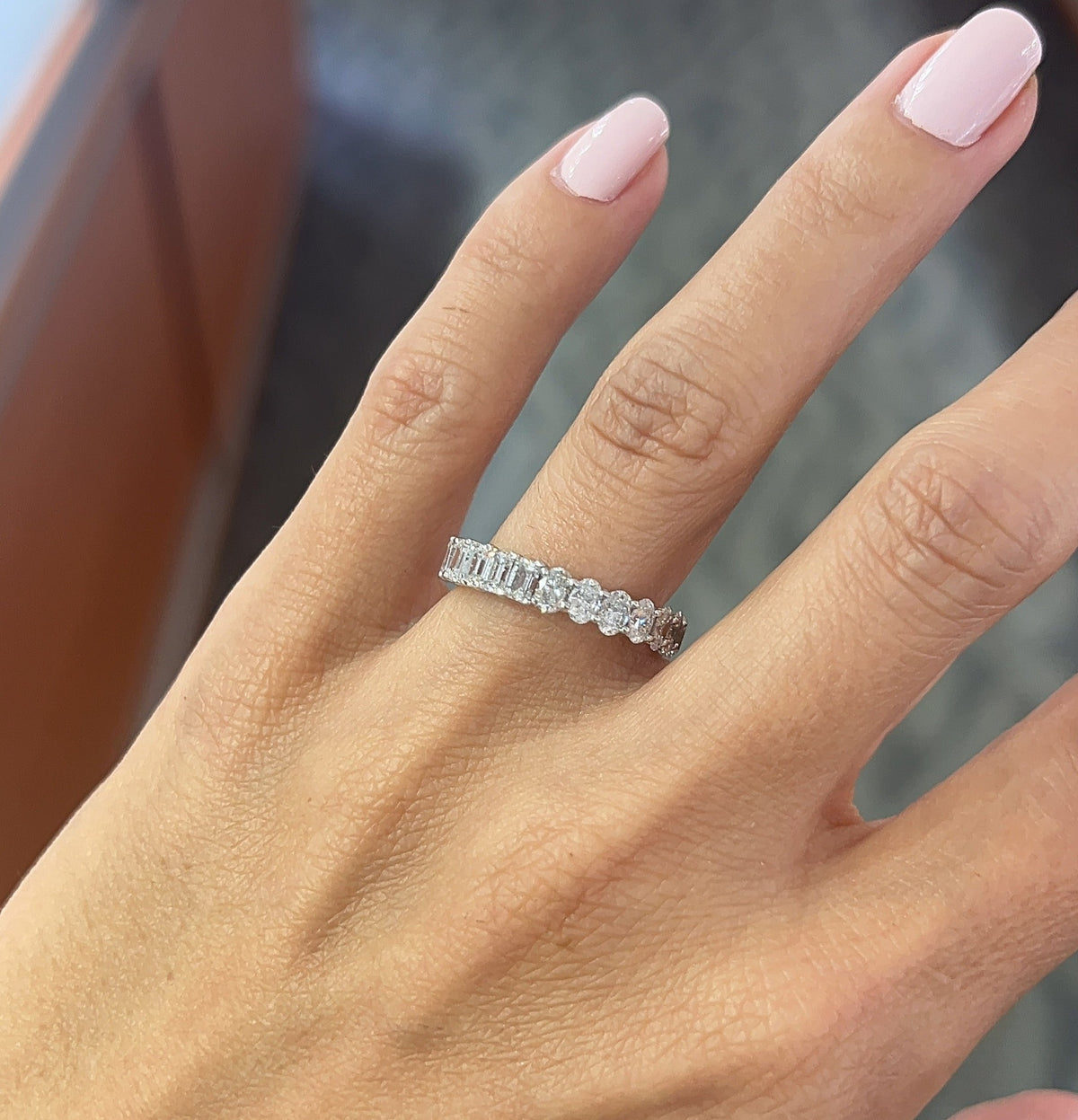 Half Oval & Half Emerald Eternity Band – Henri Noël