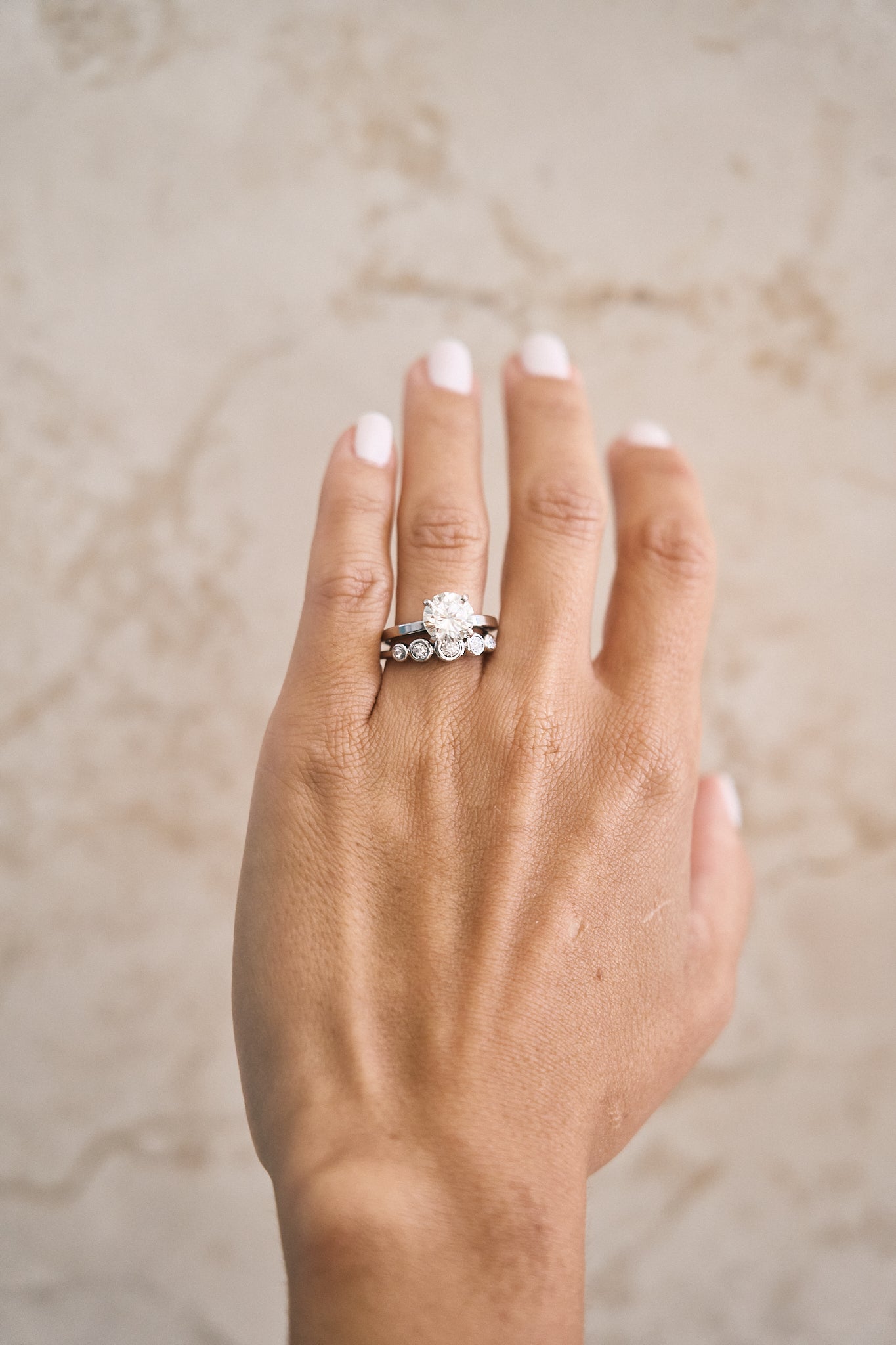 Graduated Bezel Diamond Ring