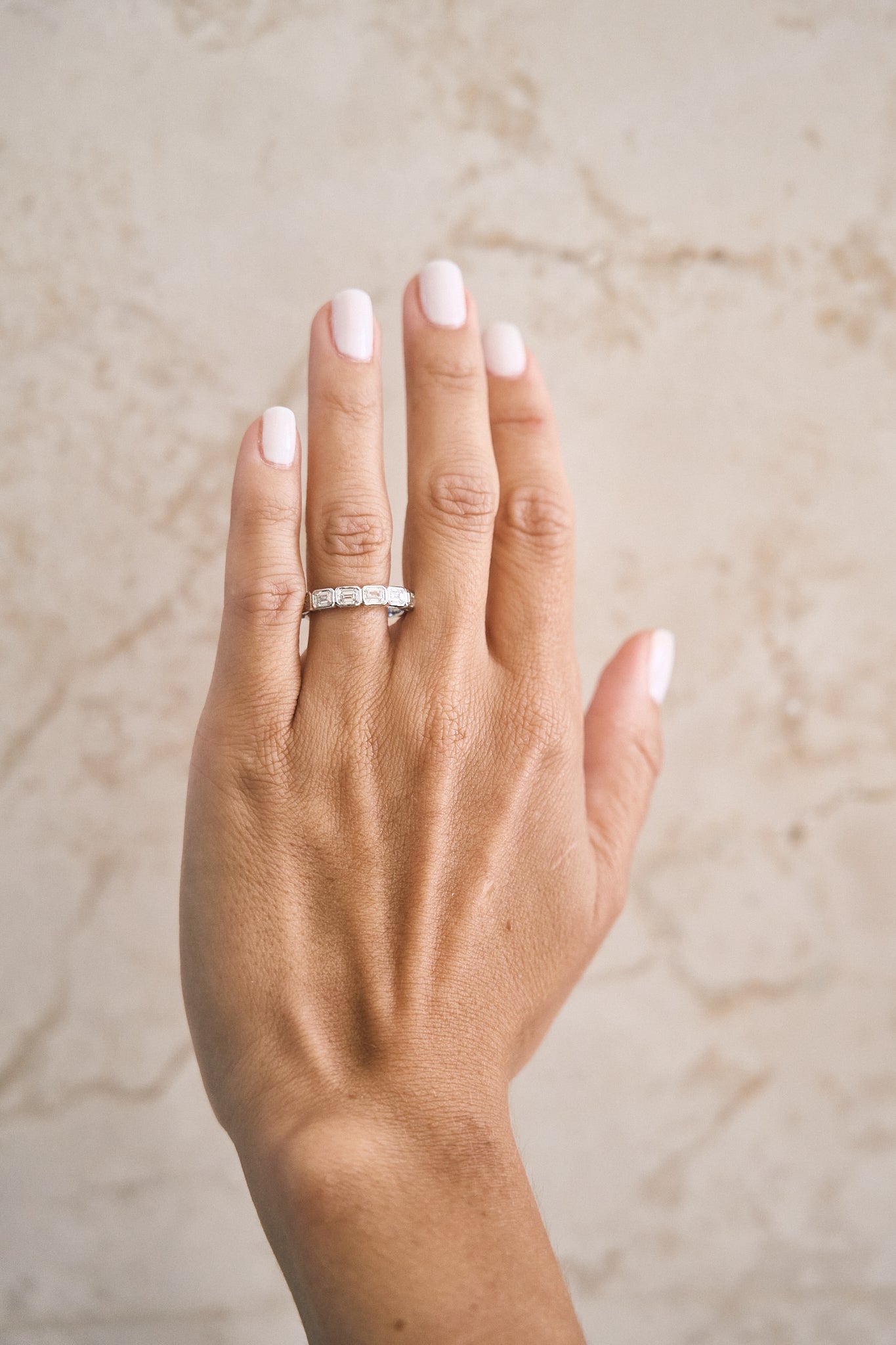 Bezel East West Emerald Cut Half Band