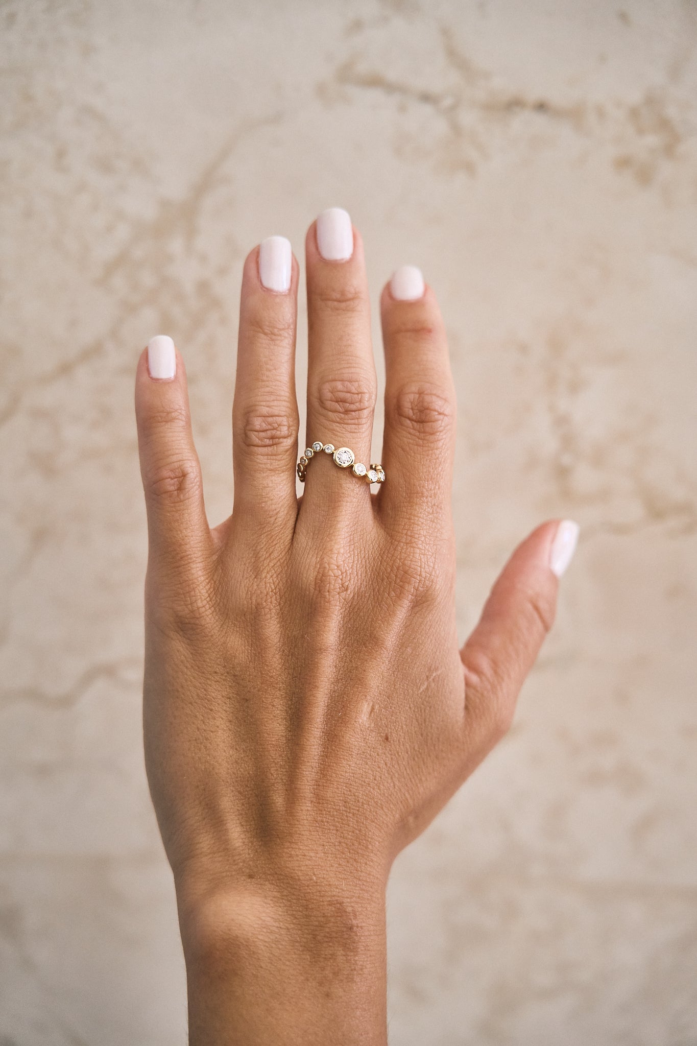 Graduated Diamond Bezel Wave Ring