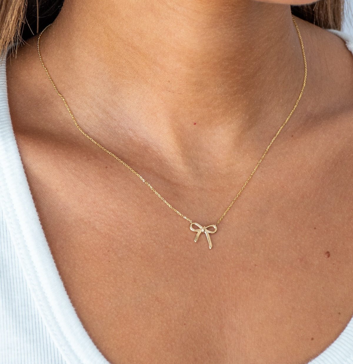 Gold and Diamond Bow Necklace