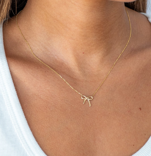 Gold and Diamond Bow Necklace