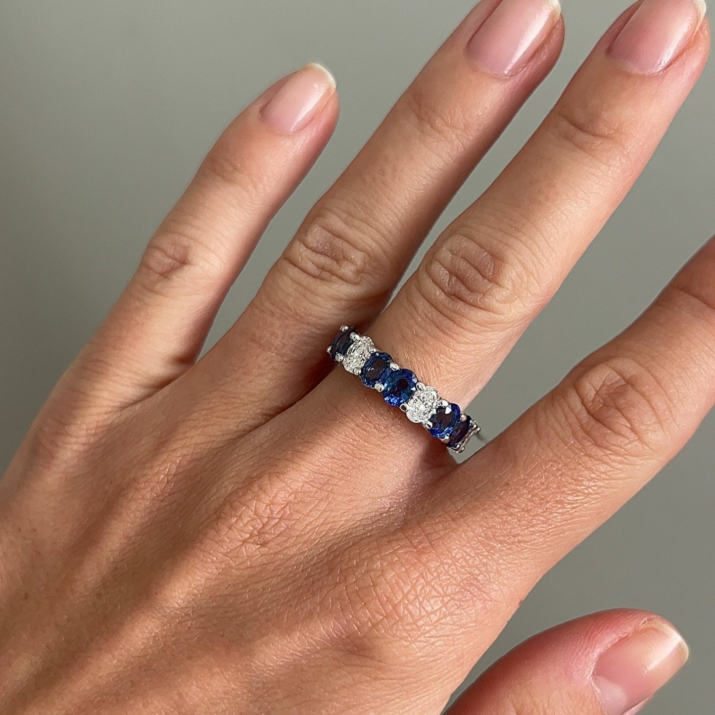 oval diamond and sapphire eternity band