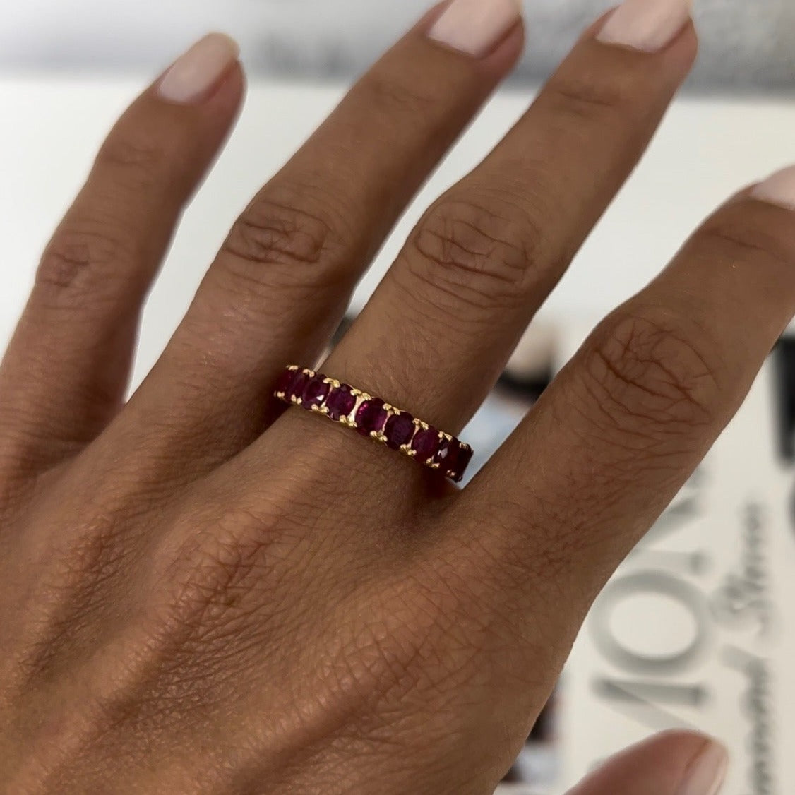 Oval Ruby Eternity Band – Henri Noël