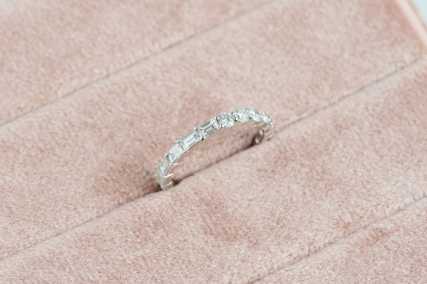 Half Round & Half Emerald Eternity Band – Henri Noël