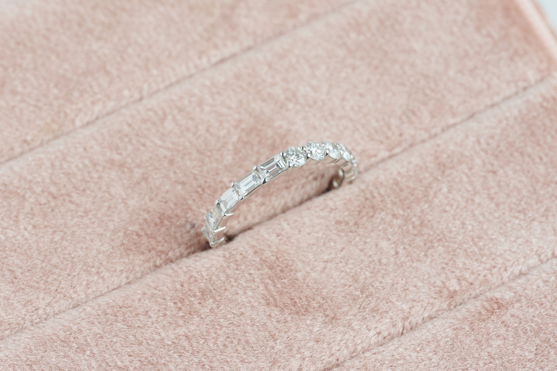 Half Round & Half Emerald Eternity Band – Henri Noël