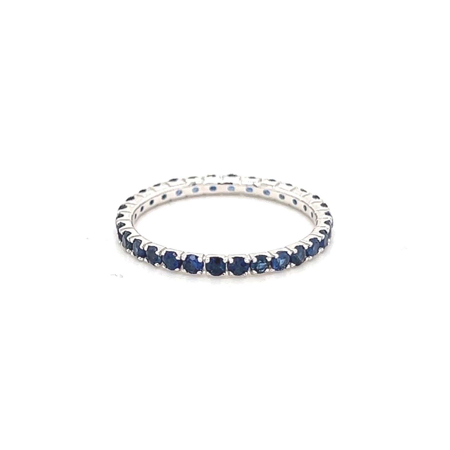 Small Blue Sapphire Eternity Band – Henri Noël